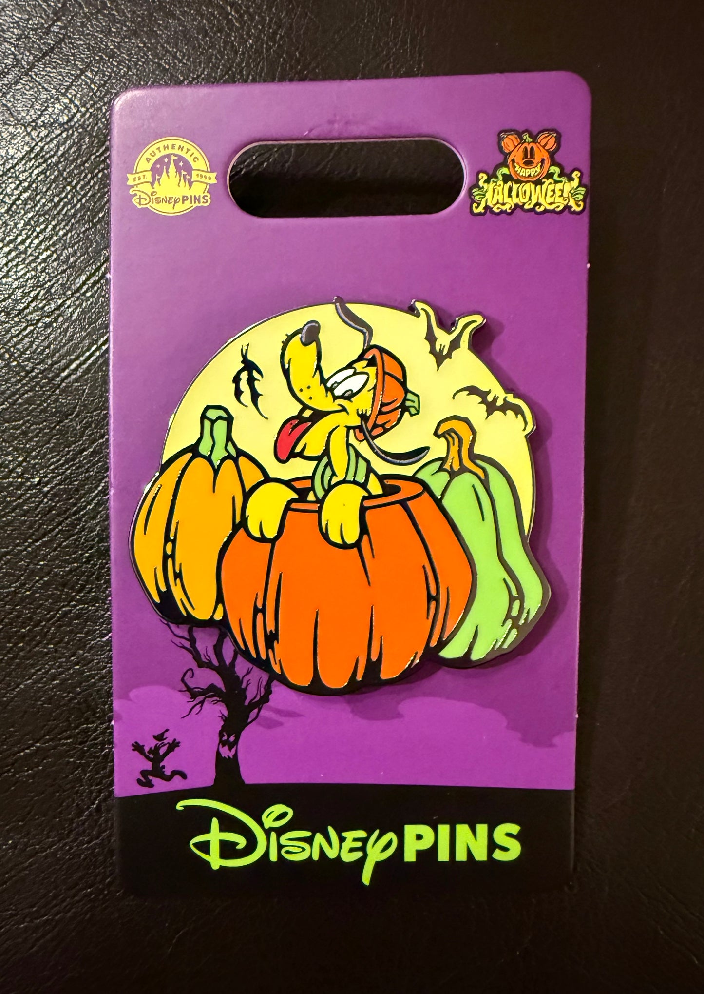 Pluto Popping Out of Pumpkin